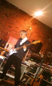 Roger on bass at the Shabby Road Studio. Image courtesy of Originalhipster.net