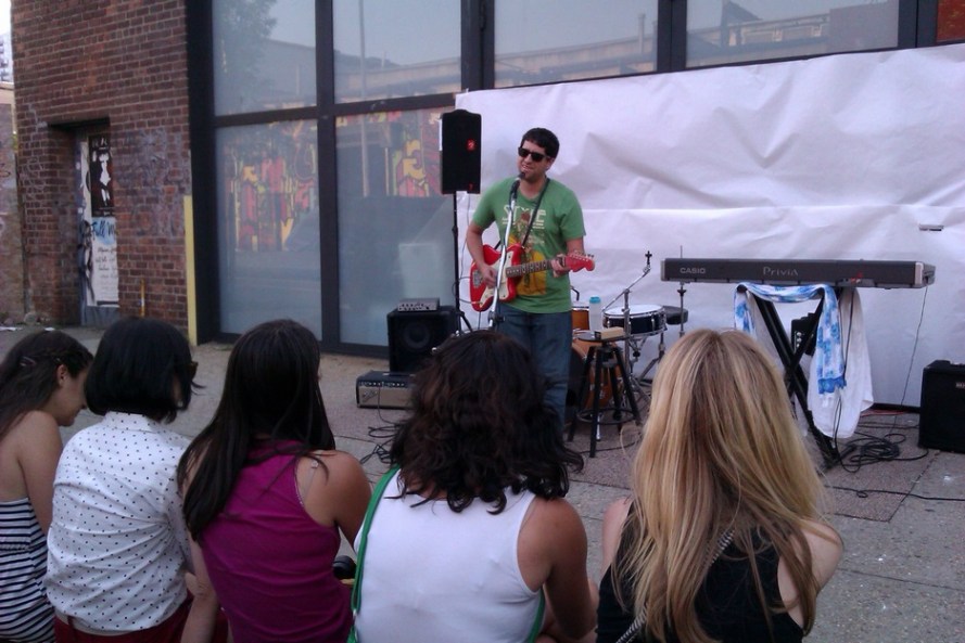 Alan Cohen performs in front of Kinfolk Studios in Brooklyn on June 21, 2013