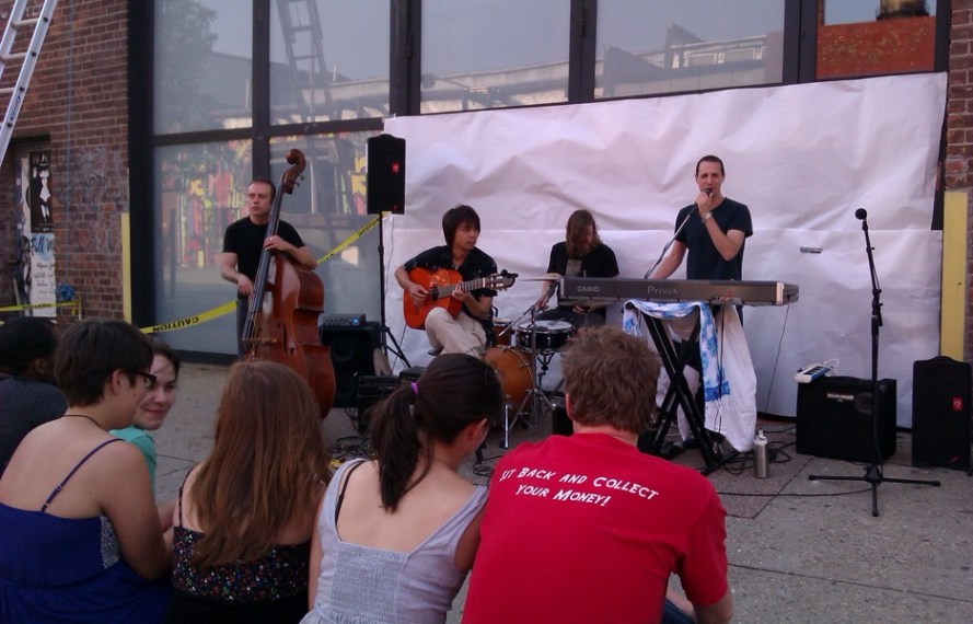 Avi Wisnia performs in front of Kinfolk Studios in Brooklyn on June 21, 2013