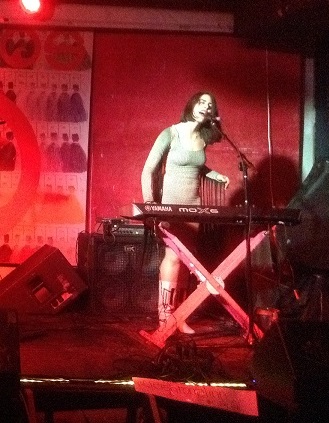 Janna Pelle sings and plays keyboard at her Album Release concert at Pianos, for her latest record, 
